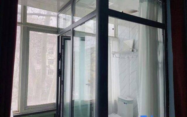 Zhouyang Youth Hotel (People's Hospital Subway Station)