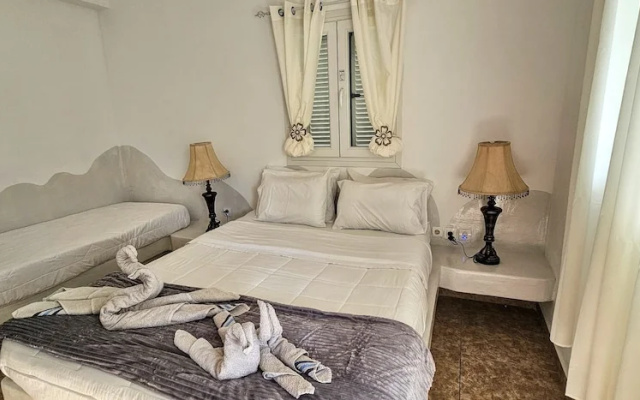 Santorini Studios Pleasure By The Sea