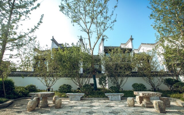 Xinhualian Lv Xin Gu Hotel
