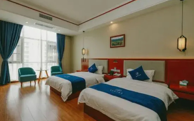 Pu'erxing Xige Hotel