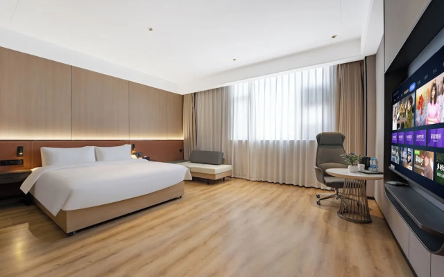 Wanzai Yijia La Maison Hotel