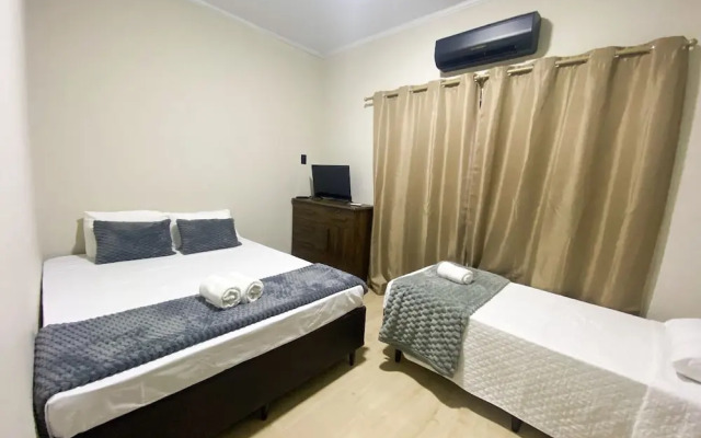 Casa Central piscina e AC para 8 hospede