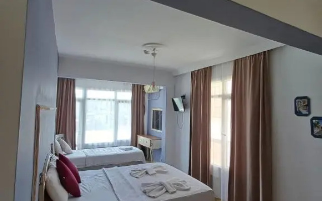 Renos Otel Cafe Sigacik