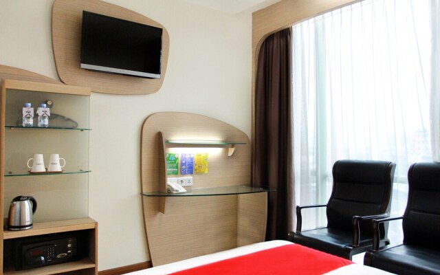 Capital O Business Hotel