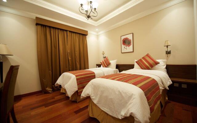 Rawasi Hotel Apartments الرواسي للشقق الفندقية