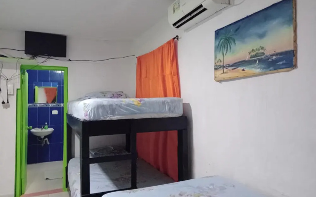 Room in Guest Room - Green Sea Inn in the San Luis Sector