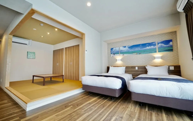 Coral Palace Onna by Sunset Avenue