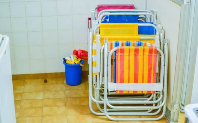 150m da praia com piscina aquecida e sauna