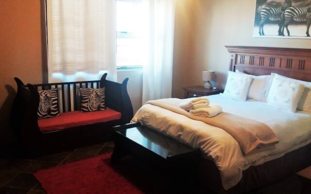 "room in B&B - Room for 6 - Amarachi Guesthouse in Swakopmund Namibia Near Beach and Malls!"