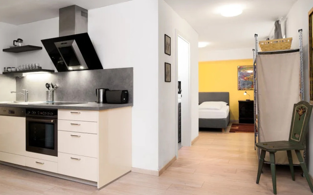 Golden Roof Apartments by Penz