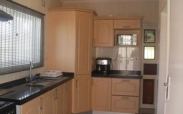 Home Up Guest House