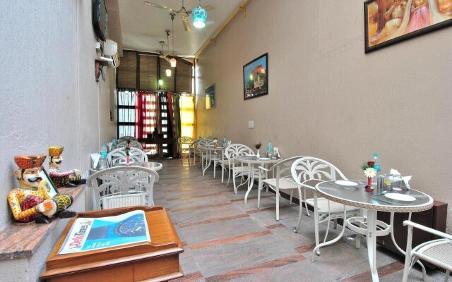 Cosy Grand @Chanakyapuri by The Cosy Hotels.
