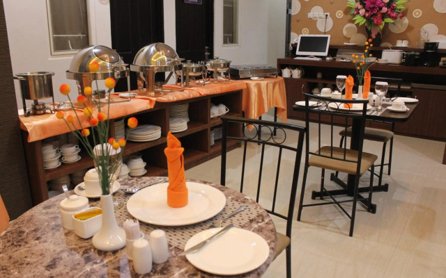 Airy Mapanget AA Maramis Manado