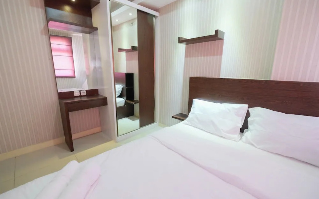 Homey and Relaxing 2BR Green Pramuka Apartment