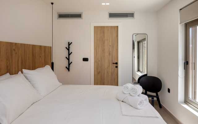 Monogram Travel Tinos