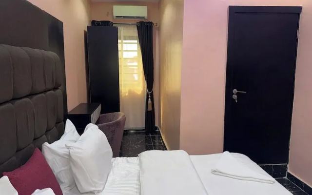Next Level Hotel & Suites