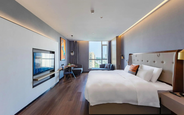 Ginza Jiayue Select Hotel (Qihe Wanda Plaza Spring City Oulebao)