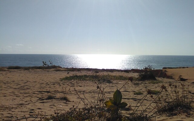 Chales Subindo as Dunas