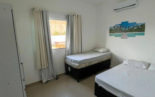 casa de praia com piscina e hidromassagem