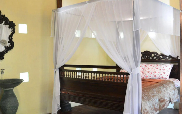 The Riverside Javanese Cottages