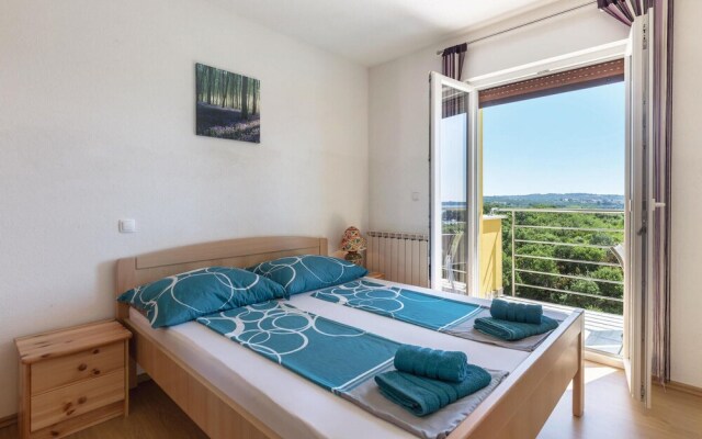 Amazing Apartment in Pomer With 2 Bedrooms