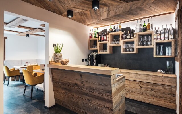 Les Dolomites Mountain Lodges