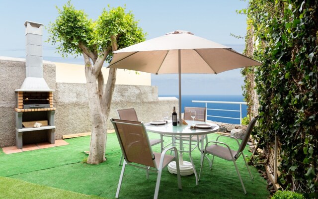 Duplex Acorán with pool and sea view