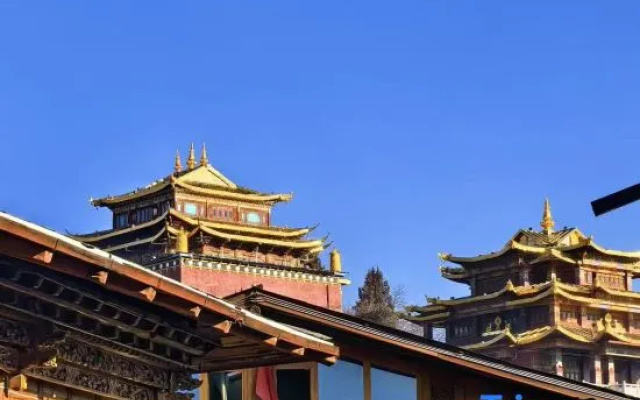 Paradise | Manju Fuyou · Log Warm House (Dukezong Ancient City Branch) – Exterior – Shangri-La