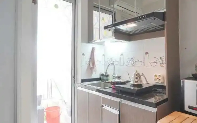 Best Startegic 2BR Apartment at Bassura City By Travelio