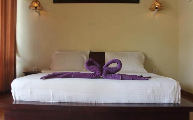 Penginapan Lakeside Cottages by ZUZU – Guest Rooms – Kintamani