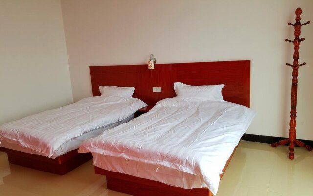 Weizhou Island Wan Jia Deng Huo Inn