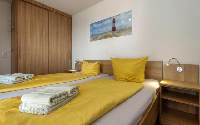 Ferienwohnung-308-Hohe-Lith-Duhnen-mit-eigenem-Strandkorb-am-Strand