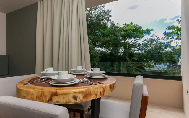 Kaab by the Beach. Condo with roofpool