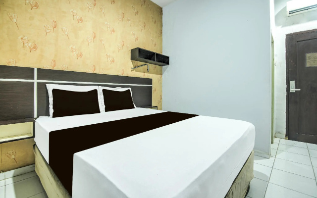 Hotel O Makassar near Mall Panakukang formerly Hotel Lucky Inn Makassar – Guest Rooms – Makassar