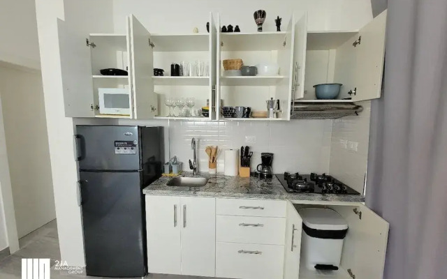 2JA Management Group - White Hill Condos