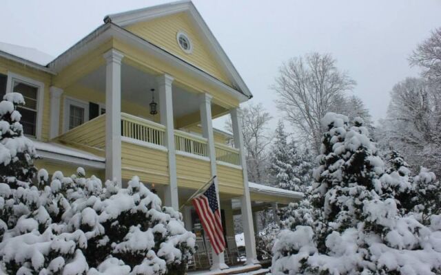 The Yellow House on Plott Creek Road