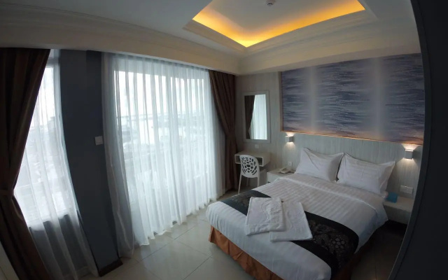 Pacific Inn – Guest Rooms – Semporna