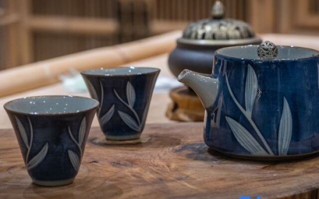 Wuzhen Moxun Qiao Qingshe