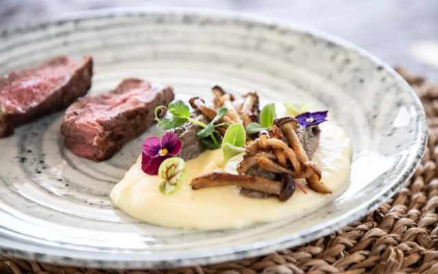 Adorno Beach Hotel & Suites