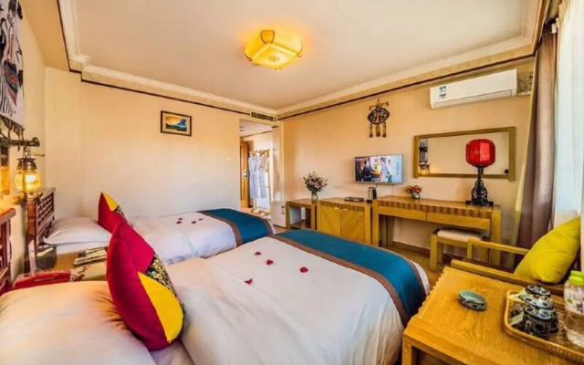 Lijiang Qianxuelou Hotel