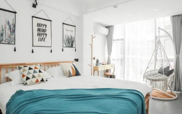 Deep Blue Inn Boutique Holiday Apartment (Qingdao Oriental Movie Metropolis Rongchuangmao Branch) – Guest Rooms – Qingdao