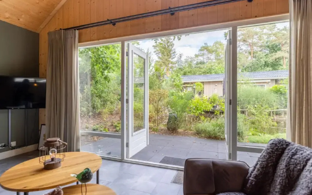 Forest Lodge in Nature With Pond Views