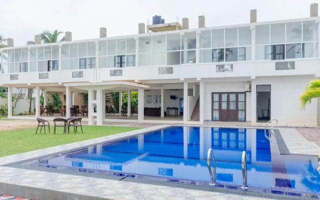 OYO 406 Moya Hotel & Beach Resort