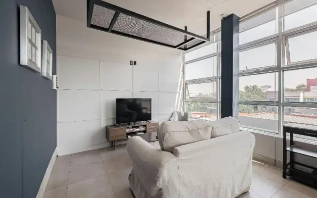 Bed in mixed room near Coyoacan