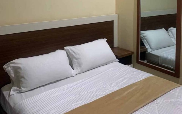 RedDoorz @ Kampkey Tanah Hitam – Guest Rooms – Jayapura