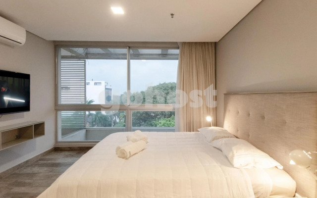 Encantador Apartamento en Villa Morra 1D004