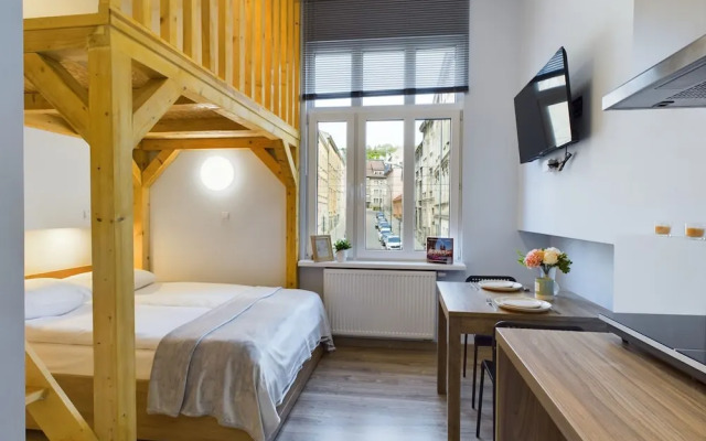 Wooden Cracow Apartment by Renters