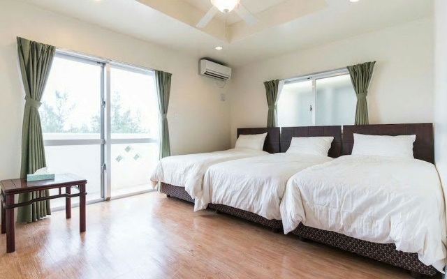 Sea Side Yaka – Guest Rooms – Kin
