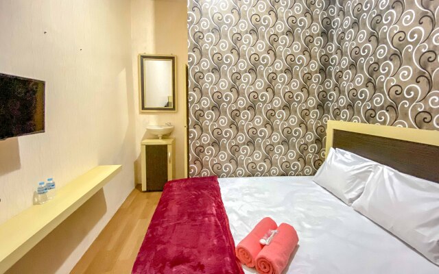 Tini's Guest House Malang RedPartner