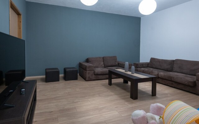 Grey House by Checkin